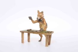 A COLD PAINTED BRONZE OF A FOX CROUPIER,