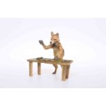 A COLD PAINTED BRONZE OF A FOX CROUPIER,