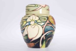 A MOORCROFT ORCHID ARABESQUE GINGER JAR BY EMMA BOSSONS, of ovoid form, painted and impressed marks.