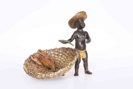 A COLD PAINTED BRONZE OF A FISH SELLER,