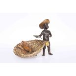 A COLD PAINTED BRONZE OF A FISH SELLER,