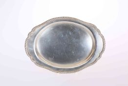 A SILVER TRAY, Barker Bros Ltd, Birmingham 1950, of shaped oval form with gadrooned edge. 8.5oz, 23.