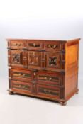 AN OAK, COROMANDEL AND FRUITWOOD BLOCK FRONT CHEST, in two sections,