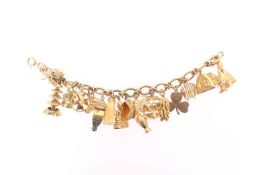 A 9 CARAT GOLD FANCY LINK CHARM BRACELET,