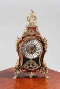 A BOULLE GILT-METAL MOUNTED MANTEL CLOCK IN ROCOCO STYLE,