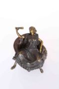 A METAMORPHIC COLD PAINTED BRONZE OF A RISQUE LADY,