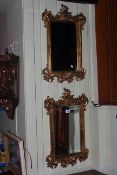 Pair ornate gilt framed rectangular bevelled wall mirrors,