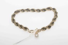 9 carat gold rope twist bracelet with pearl fob,