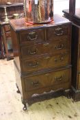 H Shaw, London, reproduction mahogany chest of two short above three long drawers on cabriole legs,