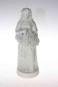 Parian figure of maiden with grape harvest,