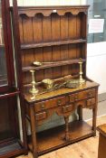Neat oak dresser, the shelf back above five drawers with potboard below,