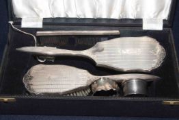 Cased silver brush and mirror set,