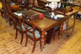 Victorian mahogany extending dining table, leaf and winder,