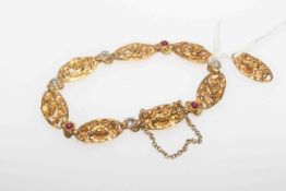 Continental gold fancy link bracelet with foliage decoration and set with diamonds and cabochon