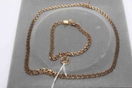 14 carat gold flat graduated link necklace and matching bracelet,