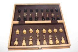 Portable chess set in wooden hinged chequer board box