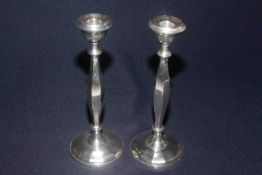 Pair silver candlesticks with hexagonal tapered columns, 25.