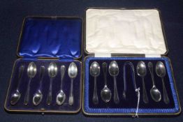 Two cased sets of six silver teaspoons,