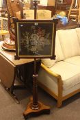 Victorian rosewood triform pole screen with needlework panel