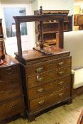 George III oak press top chest with screw-down press above four long graduated drawers on bracket