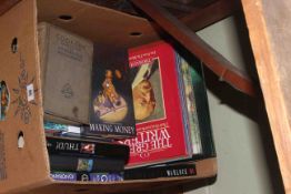 Box of books with Terry Pratchett novels