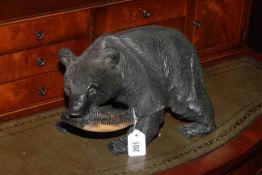 Carved wood bear with fish