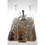 Collection of antique glassware including trumpet wine glasses,