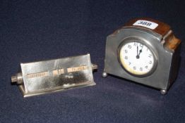 Silver mounted desk clock, engine-turned and on ball feet,