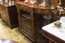 Victorian inlaid walnut credenza having central glazed door flanked by two glazed bow end doors,