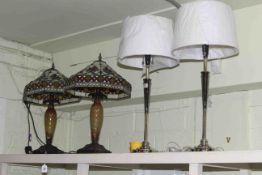 Pair of Tiffany style table lamps and pair of chrome finish table lamps and shades