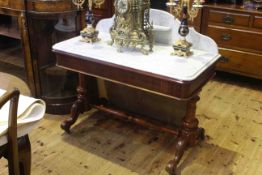 Victorian marble topped washstand raised on turned pillars joined by turned stretcher, 98.