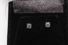 18 carat gold and round brilliant diamond earrings,