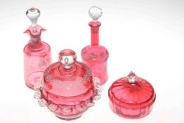 Four pieces of Victorian cranberry glass