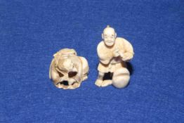 Two antique ivory netsukes