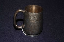 London hallmarked Victorian silver christening mug profusely decorated