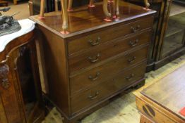 19th Century mahogany chest of four long graduated drawers on bracket feet,