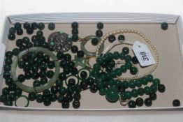 Box with green beads, bangle,