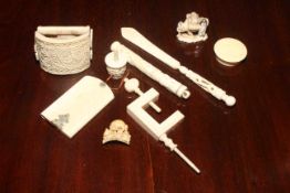 Box with small antique ivory and bone pieces including aide-de-memoir
