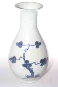 Chinese pottery vase decorated with tree, deer and crane in blue on plain ground,