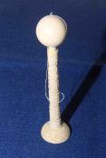 Carved ivory ball and cup game,