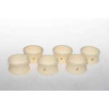 Set of six numbered ivory napkin rings,