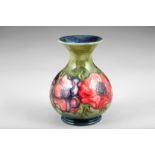 Moorcroft pottery vase, decorated in the anemone pattern. 15.5cm high