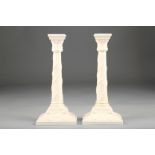 Royal Worcester porcelain candlesticks, corinthian columned with square bases, date coded 1955, 26cm