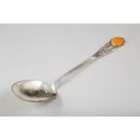 Large Danish silver spoon of Arts and Crafts Style, hammered bowl and handle with foliate relief