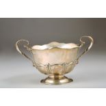 Silver double handled bowl raised on a circular foot, Assay marked Sheffield 1908 19ozs. 19.5cm