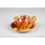 Royal Worcester tea cup and saucer, decorated with hand painted fallen fruit in a naturalistic