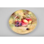 Royal Worcester plate, decorated with hand painted fruit on a naturalistic background, signed Ayrton