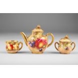 Royal Worcester miniature three piece tea service, tea pot, sugar and cream, decorated with hand