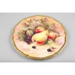 Coalport wall plate, gilt gadrooned edges, hand painted with fruit in a naturalistic background,