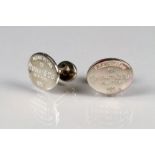 Pair of gents Tiffany & Co., silver cuff links, oval shaped with stamped ‘please return to Tiffany &